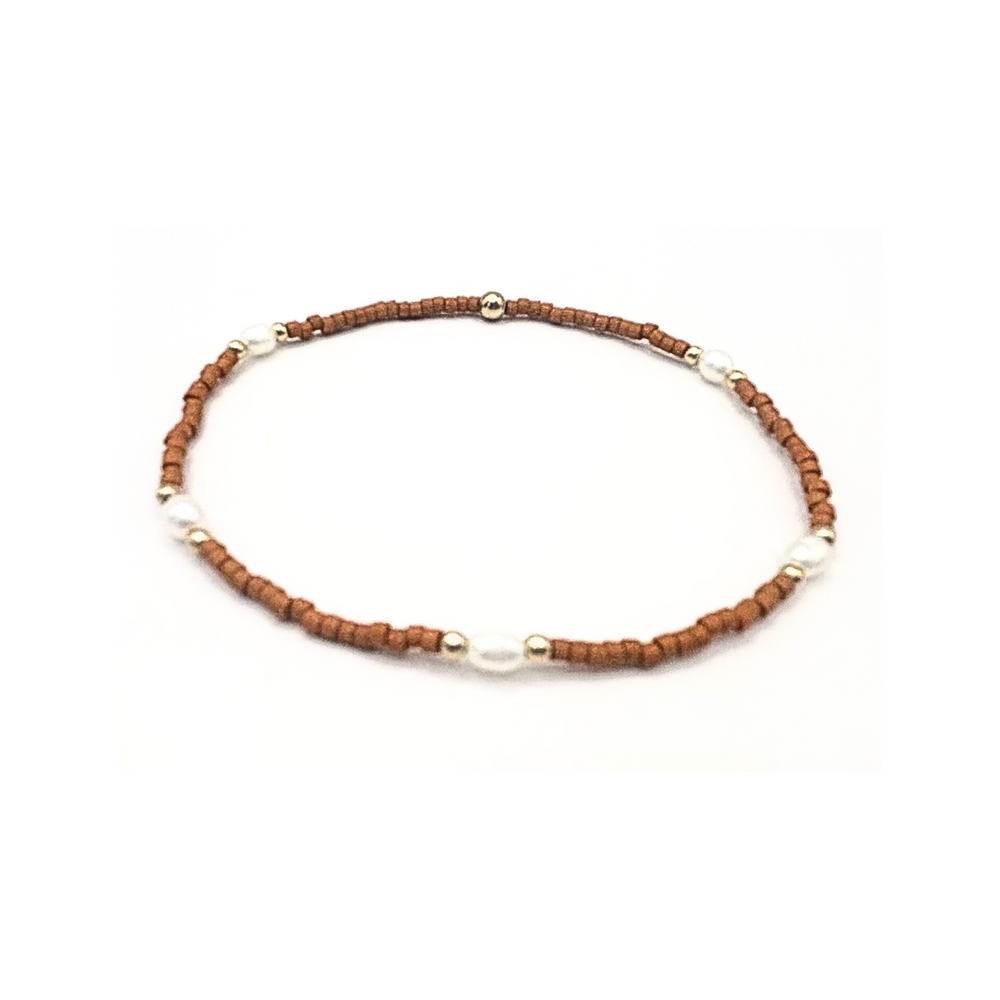 
                      
                        Game Day pearl and burnt orange bracelet – Erin Gray
                      
                    