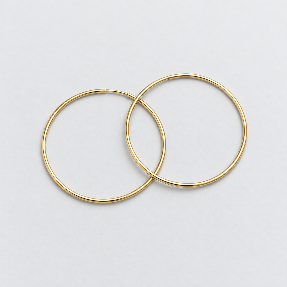 40mm gold hoop earrings from erin gray's jewelry collection, featuring sleek, endless hoop design with a polished finish.