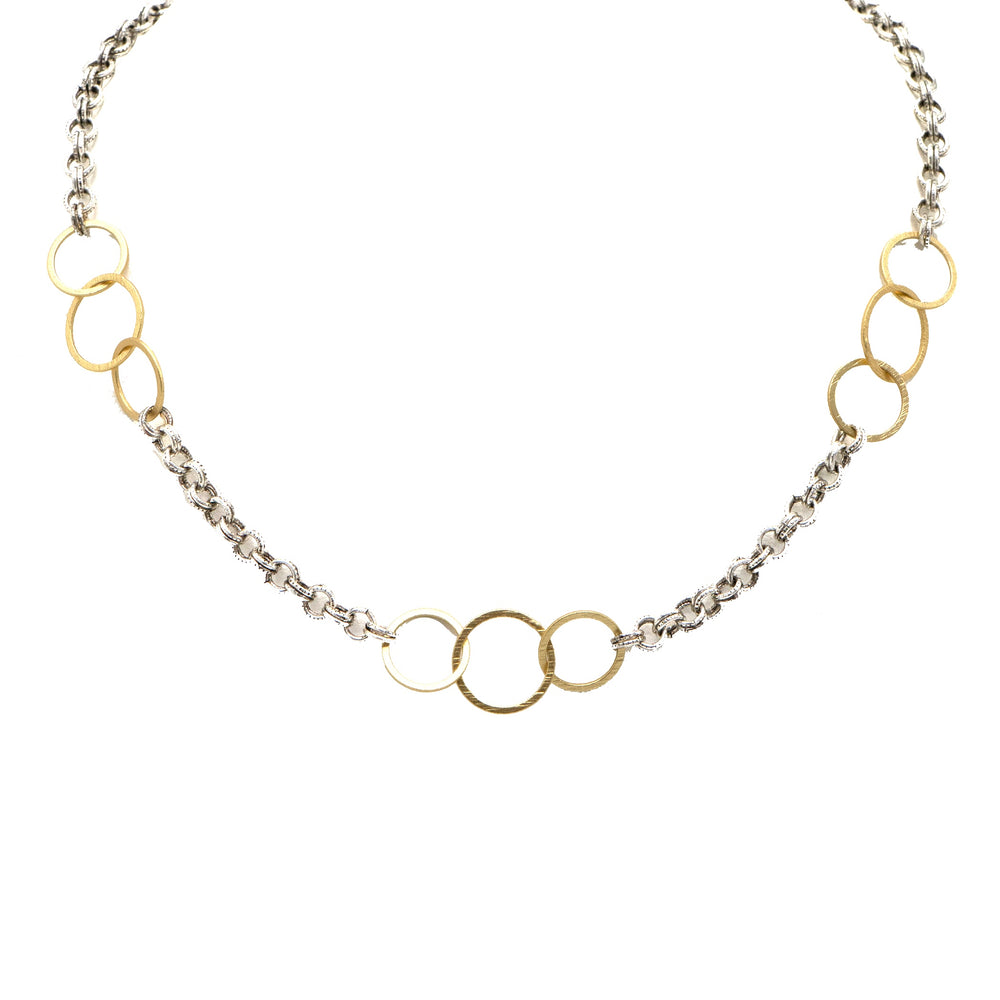 
                      
                        Allure Gold Trinity Statement Necklace in Mixed Metal
                      
                    