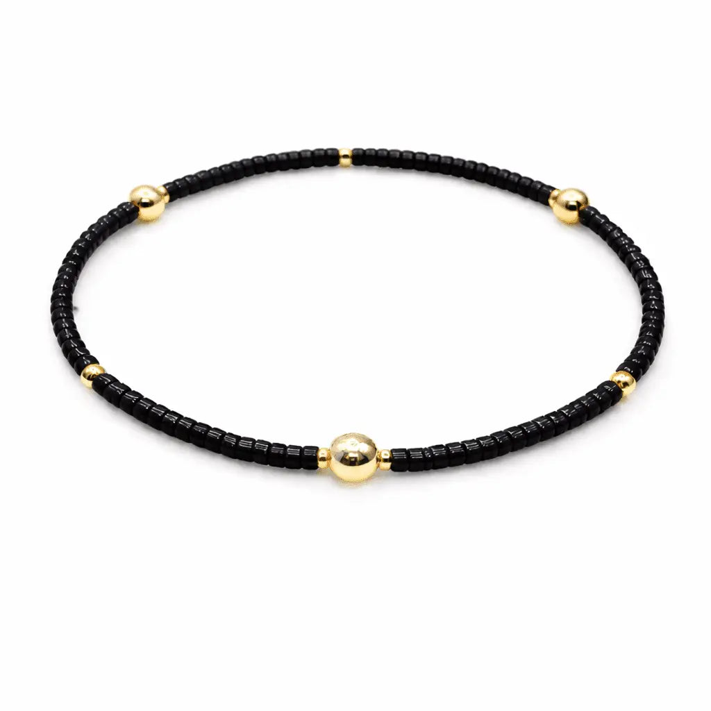 Black and gold filled bracelet from erin gray's Game Day jewelry collection featuring stylish, layered design.