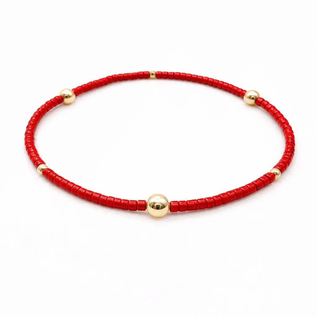 Red and gold filled bracelet from Erin Gray's Game Day jewelry collection featuring stylish, vibrant jewelry design.