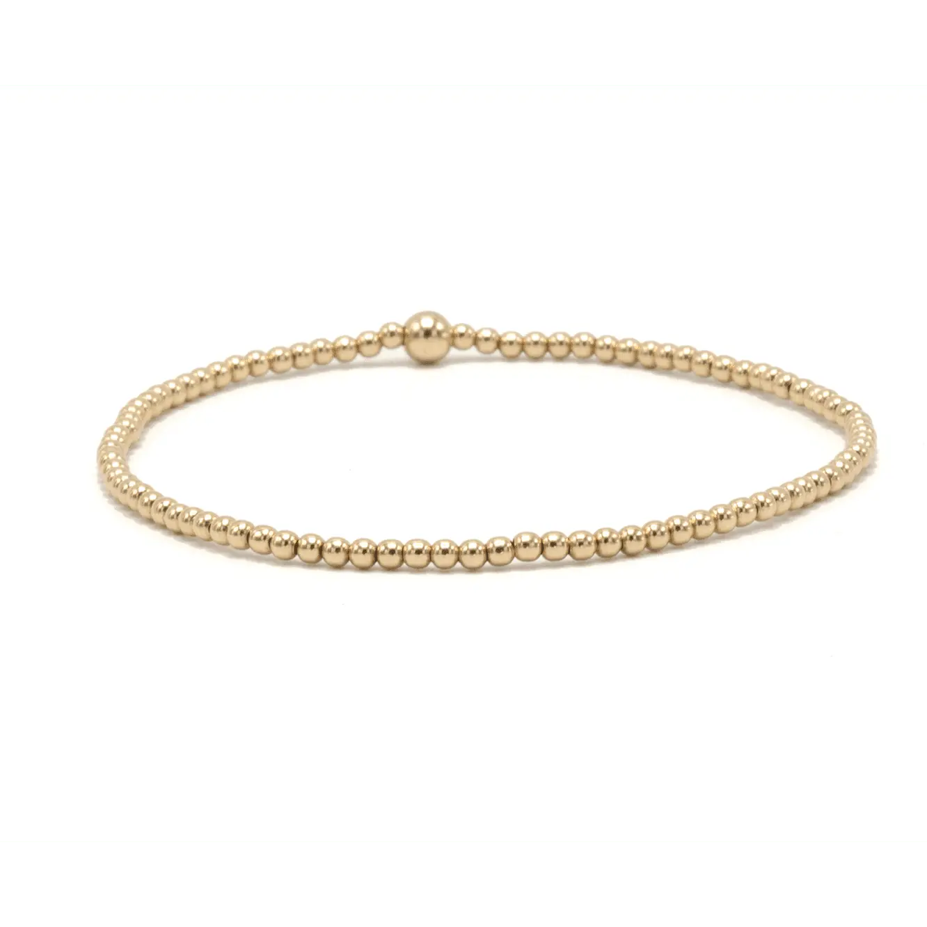 Gold filled waterproof Karma bracelet by Erin Gray featuring a 2mm chain and a single 4mm charm.