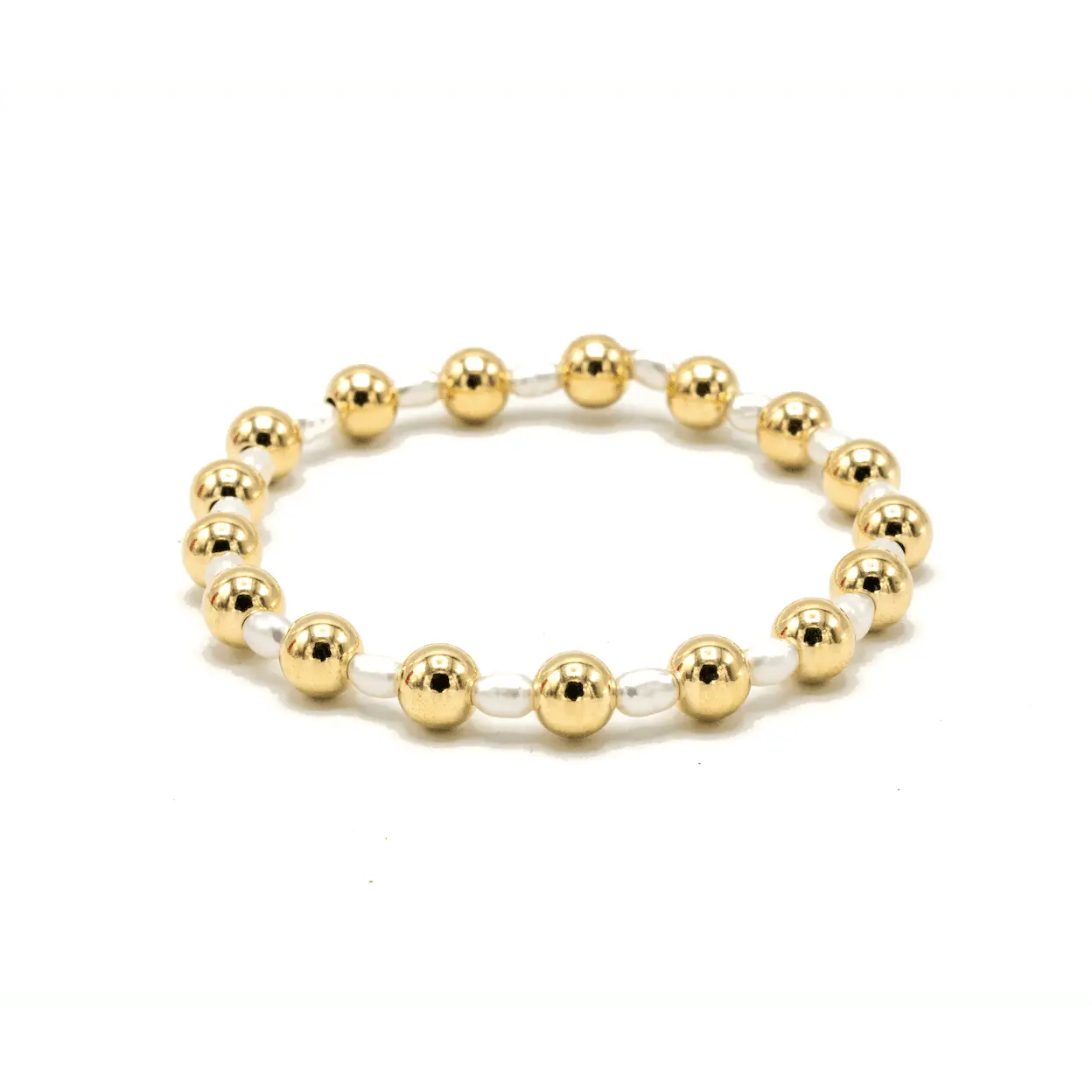 Elegant 14k gold and pearl waterproof bracelet featuring 6mm Montauk beads by erin gray, showcasing a stylish jewelry accessory.