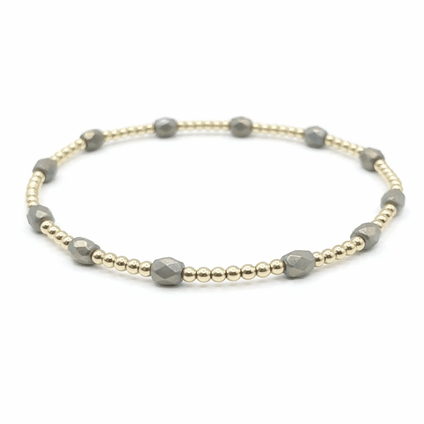 Gray The Key West bracelet by erin gray jewelry featuring diamond charm accents on a sleek band.