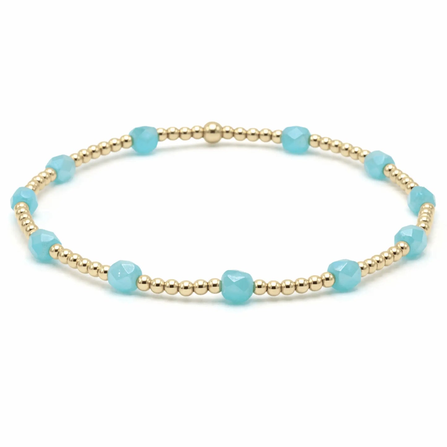 Gold and turquoise beaded bracelet from Erin Gray's Key West collection, featuring vibrant turquoise stones and elegant gold accents.