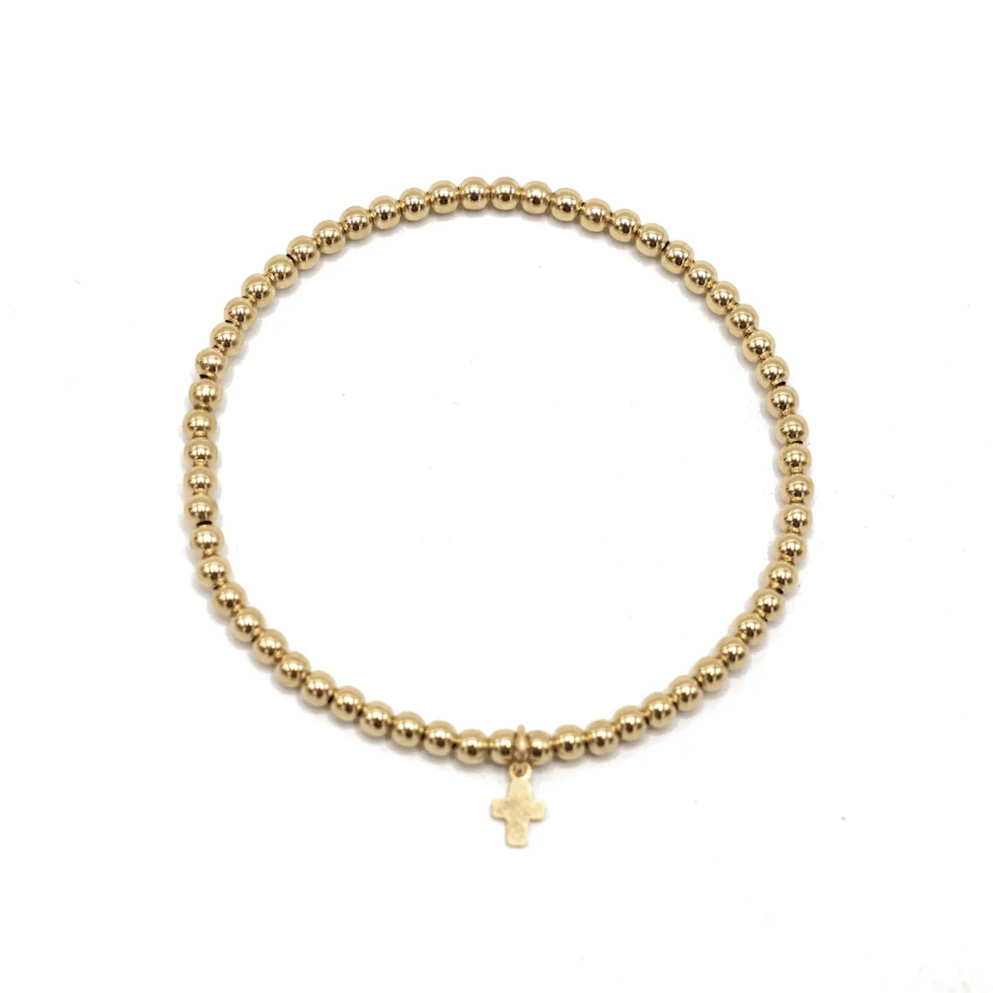 Gold filled karma waterproof bracelet with luxe cross, stylish jewelry by erin gray featuring 3mm gold beads and a cross charm.