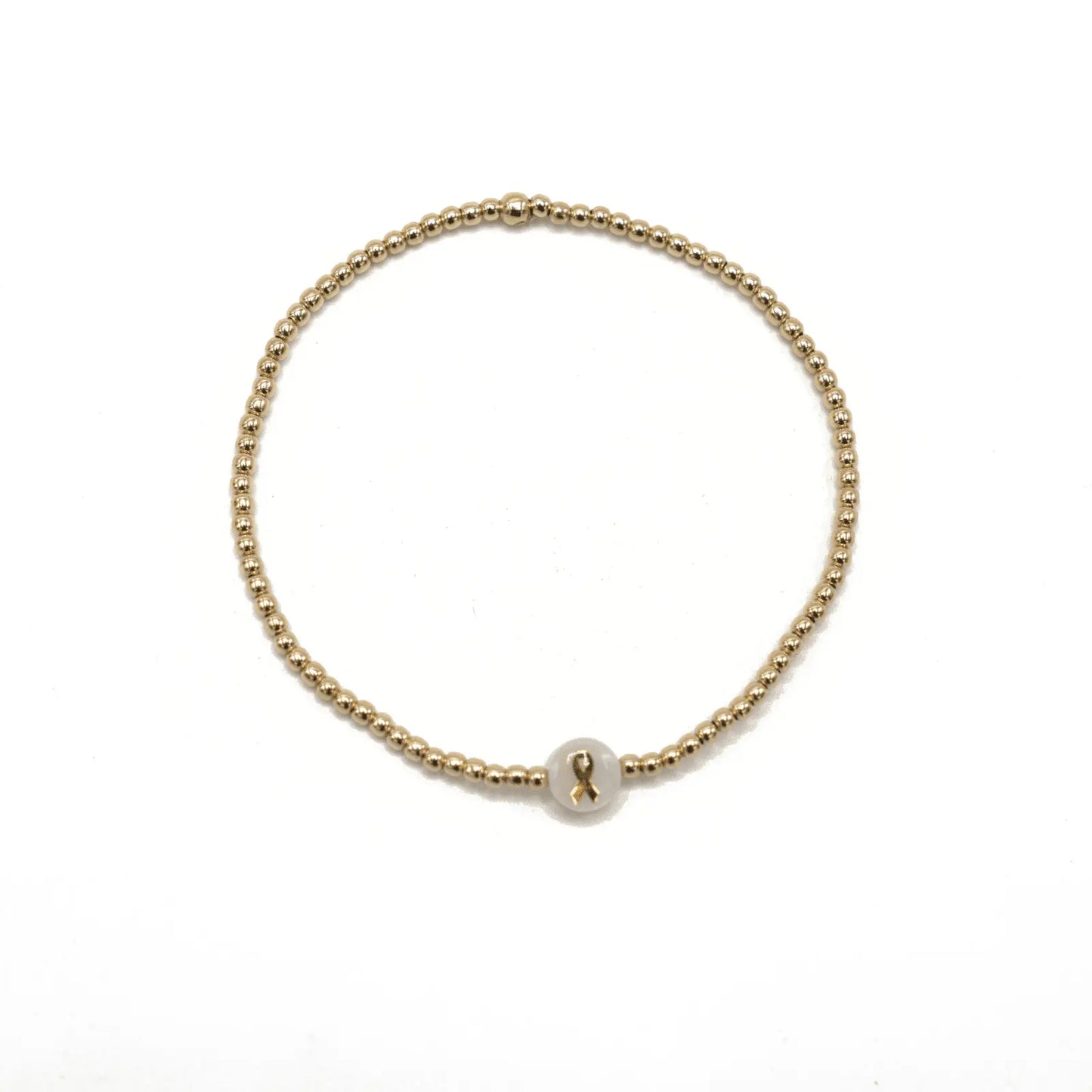 Gold filled CURE Mother of Pearl charm waterproof bracelet by erin gray, featuring a delicate Mother of Pearl pendant on a sleek bracelet.