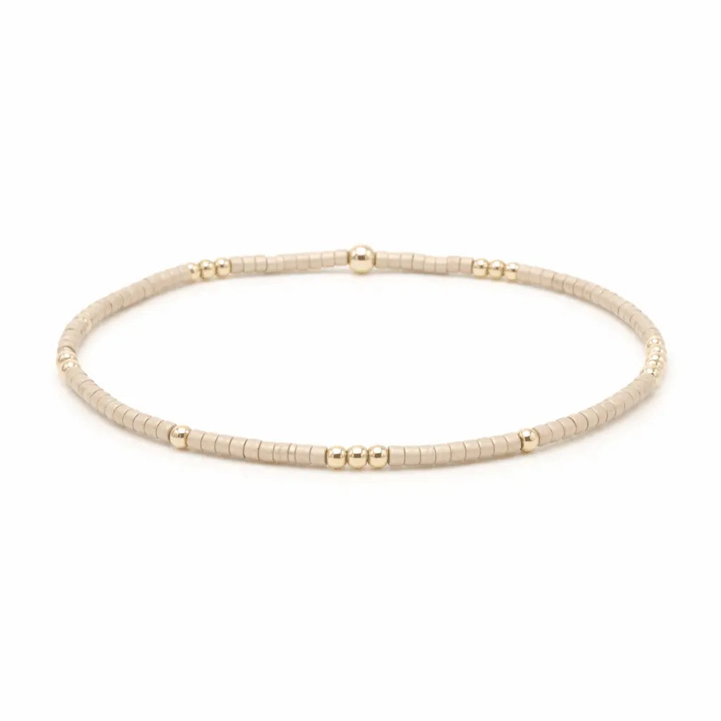 Elegant 2mm Newport GOLDEN gold-filled waterproof beaded bracelet with gold accents by Erin Gray.