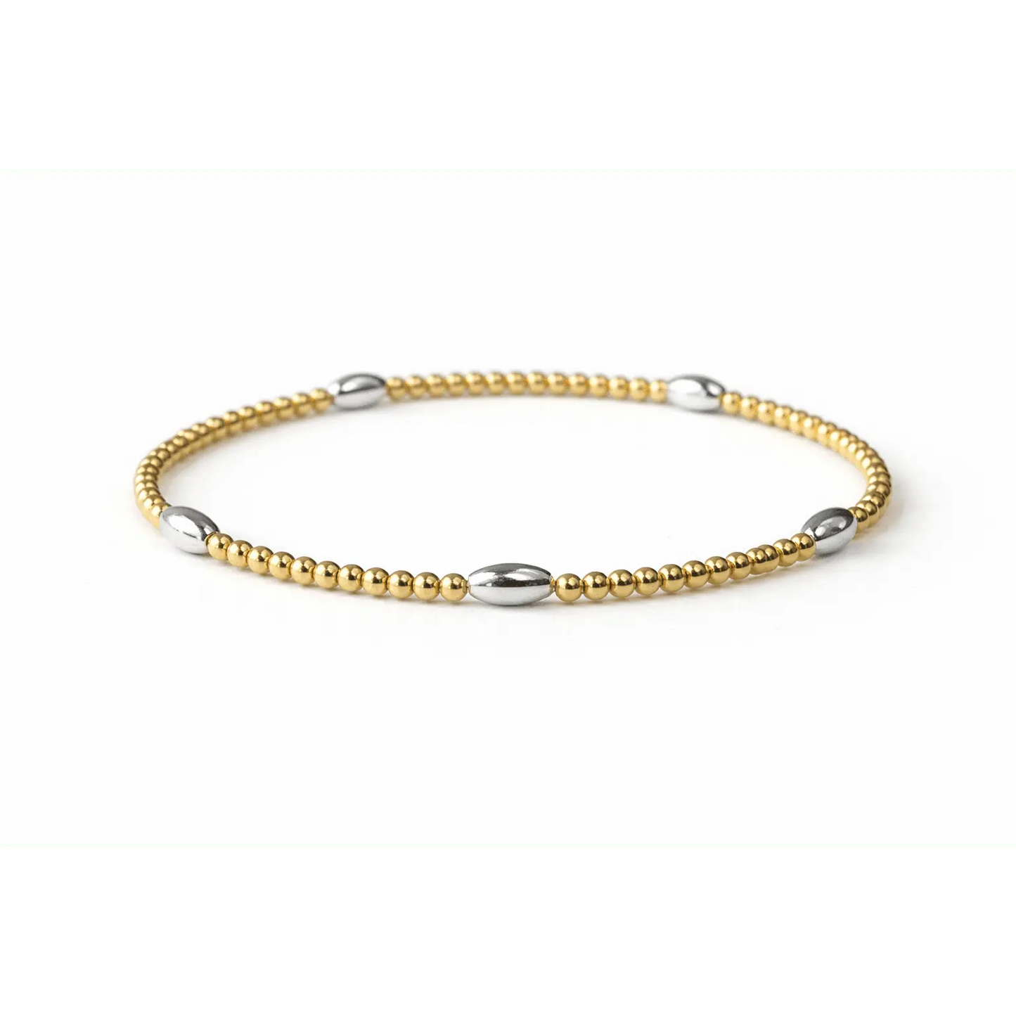 Mixed metal gold and silver oval bracelet from erin gray featuring classic oval links in jewelry style.