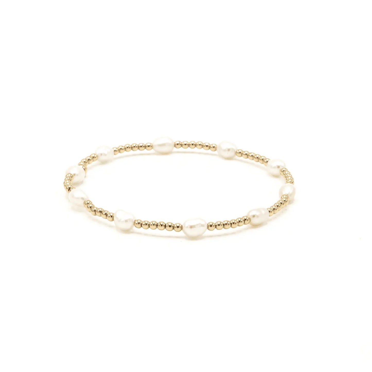 Petite patterned rice pearl bracelet with 14k gold-filled beads from erin gray jewelry, featuring delicate beaded design.