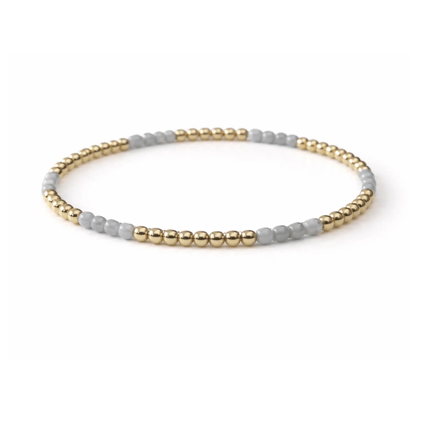 Refined light blue stone and 14k gold-filled beaded bracelet from erin gray, showcasing delicate jewelry craftsmanship.