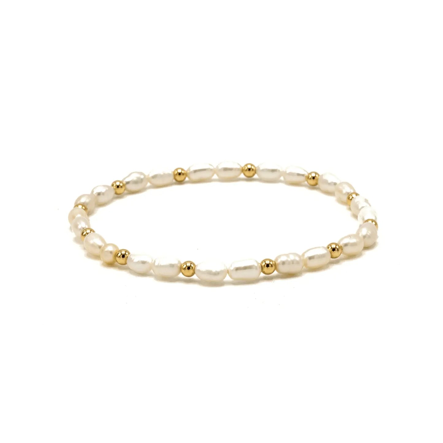 Elegant rice pearl bracelet with 3mm 14k gold-filled beads from erin gray, showcasing a delicate and stylish jewelry piece.