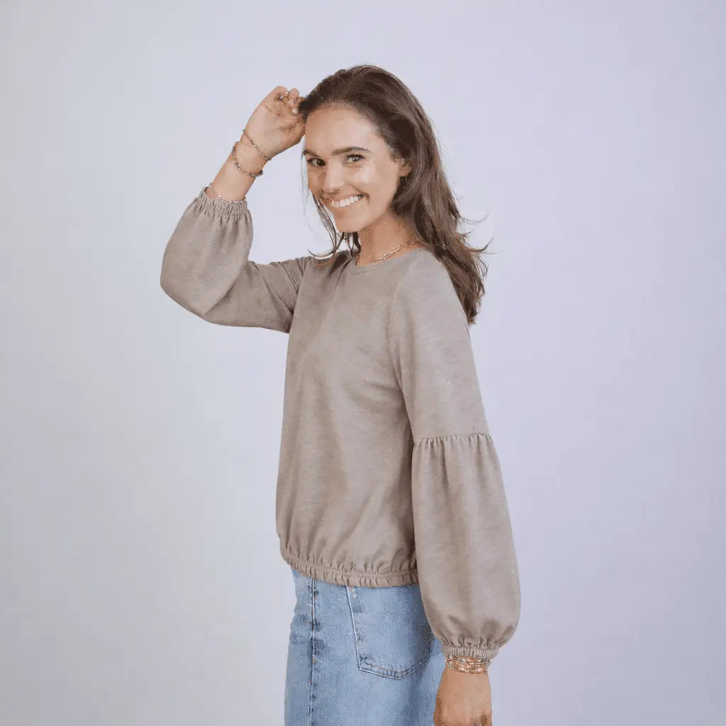 Long sleeve English Popover Top in Washed Taupe by erin gray, shown on a model highlighting the relaxed fit and soft fabric.