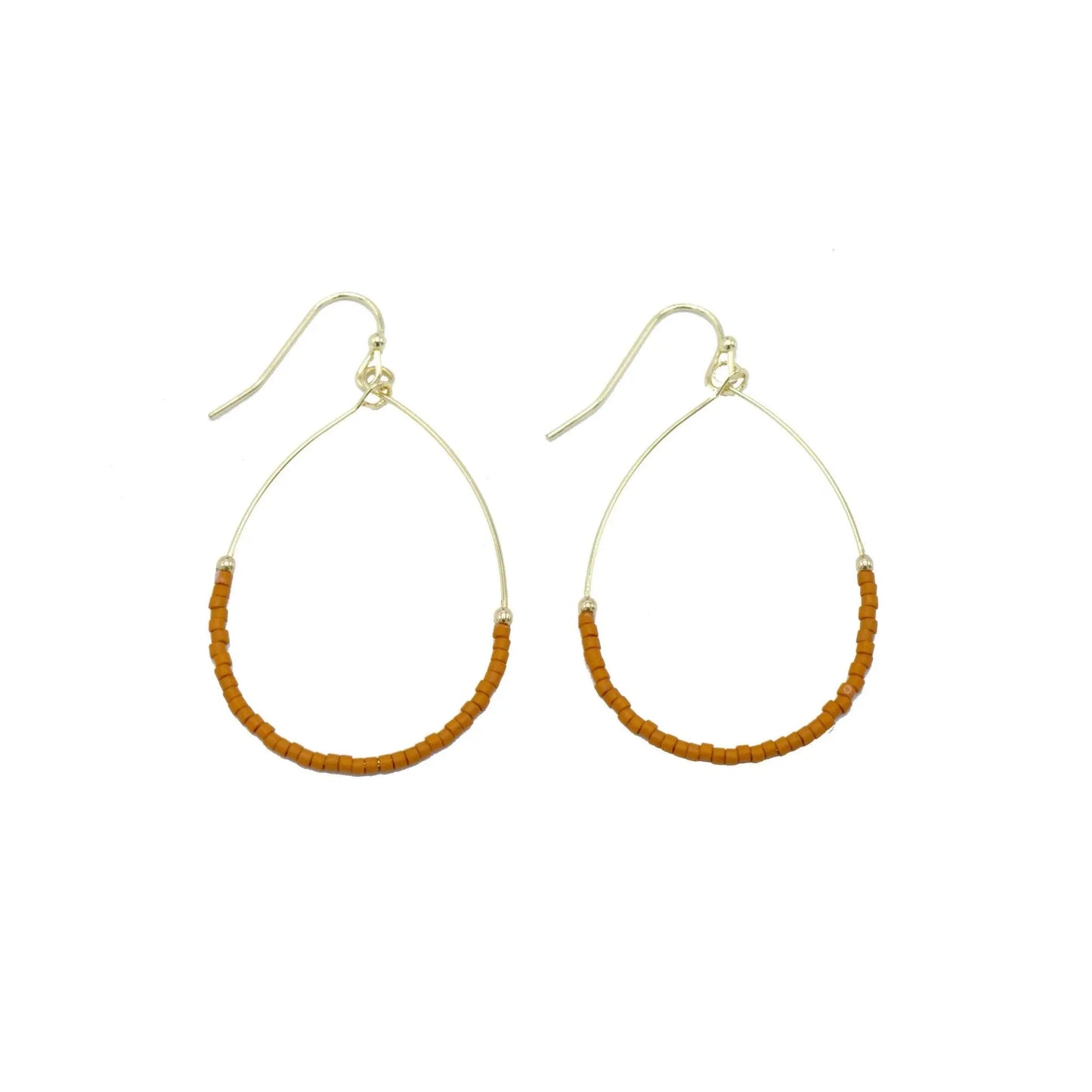 Burnt orange Aster Game Day earrings by erin gray featuring floral jewelry with vibrant orange petals and gold accents.