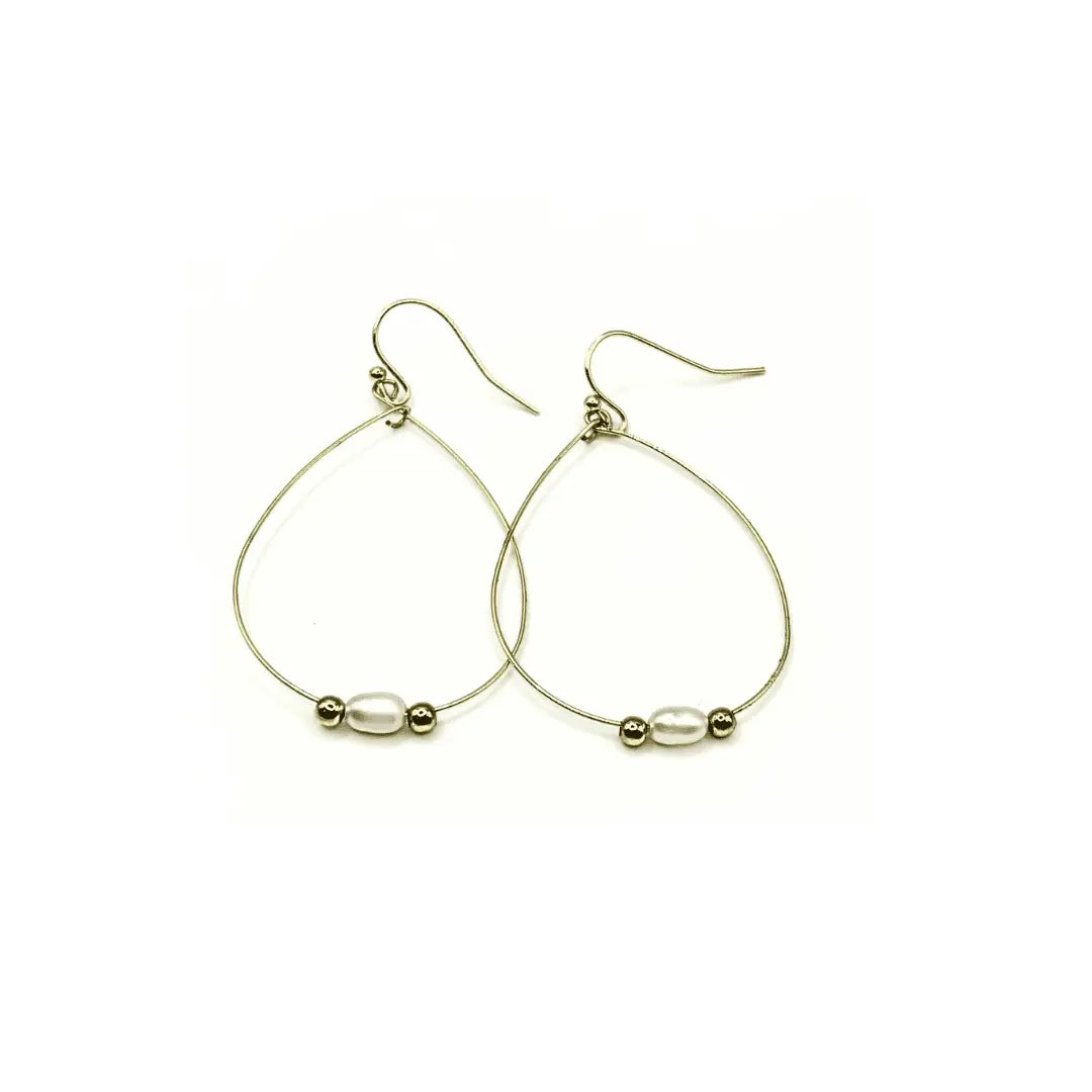 Aster Dainty rice pearls and 14k gold-filled beads jewelry by erin gray, showcasing delicate pearls and gold accents.