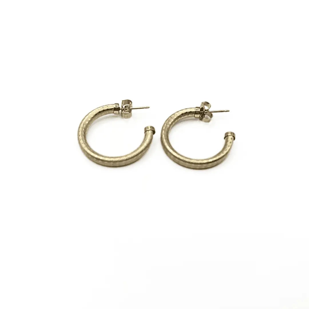 14k gold-filled Bali patterned post hoop earrings by Erin Gray, showcasing intricate design on a stylish jewelry piece.