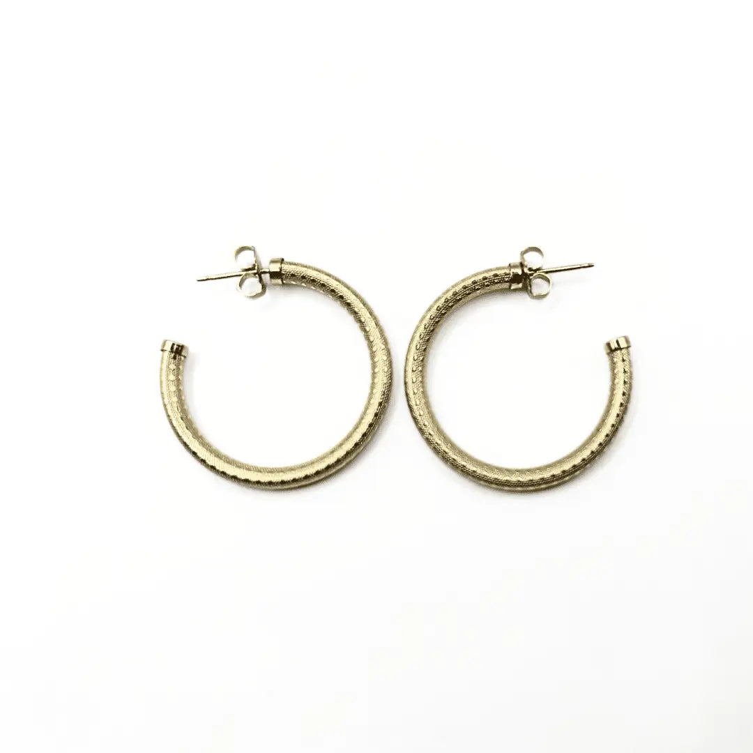 Gold filled Bali 27mm patterned post hoop earrings by Erin Gray, showcasing intricate design and polished finish.