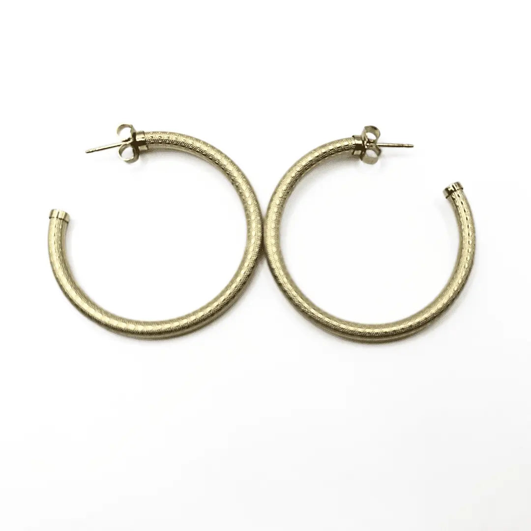 14k gold-filled Bali patterned post hoops by Erin Gray, 34mm jewelry with intricate design and polished finish.