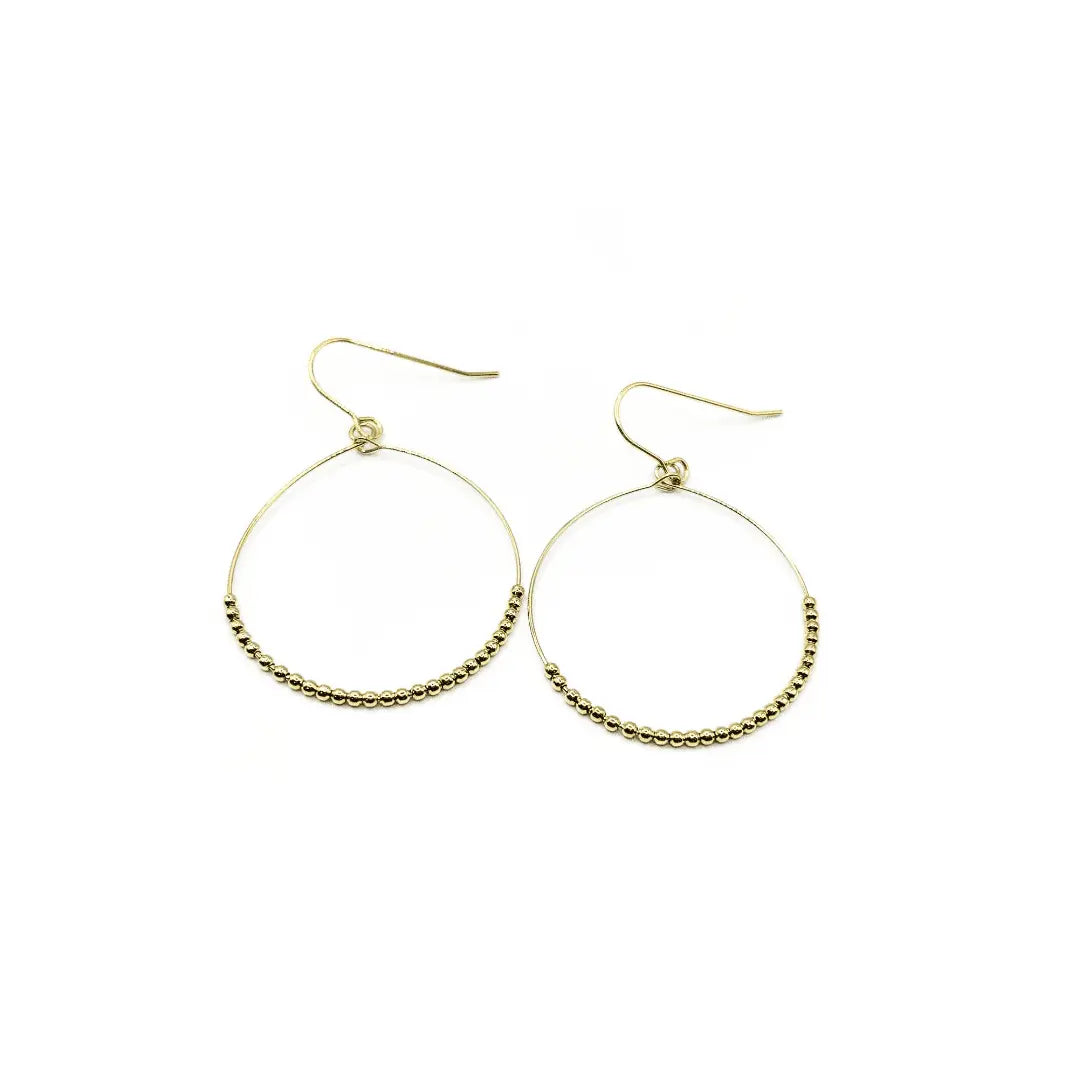 Gold filled simple beaded hoop danglers jewelry by erin gray, waterproof earrings with delicate bead detailing.