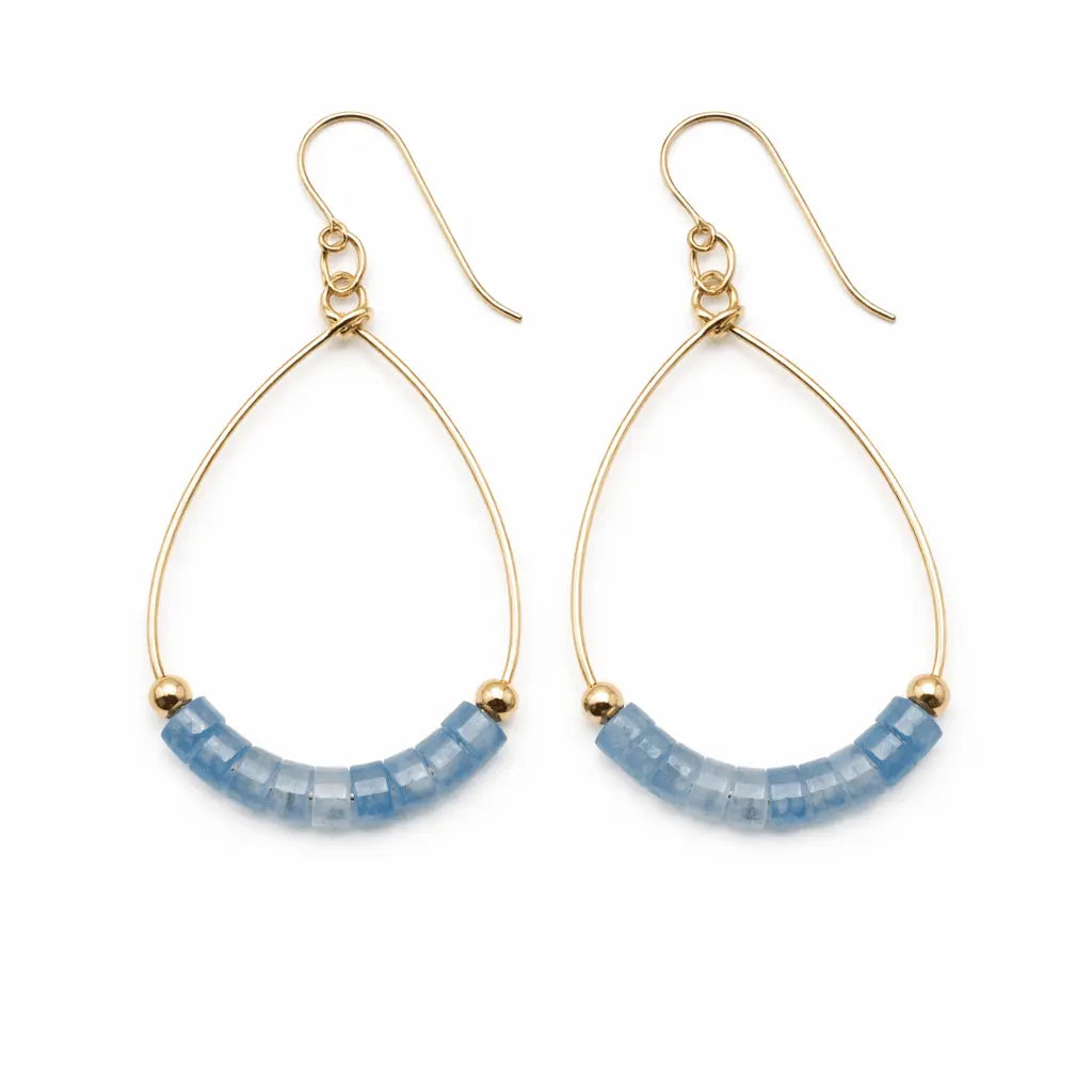 Erin Gray Heishi Aster Aquamarine waterproof jewelry earring featuring a star-shaped design and vibrant aquamarine color.