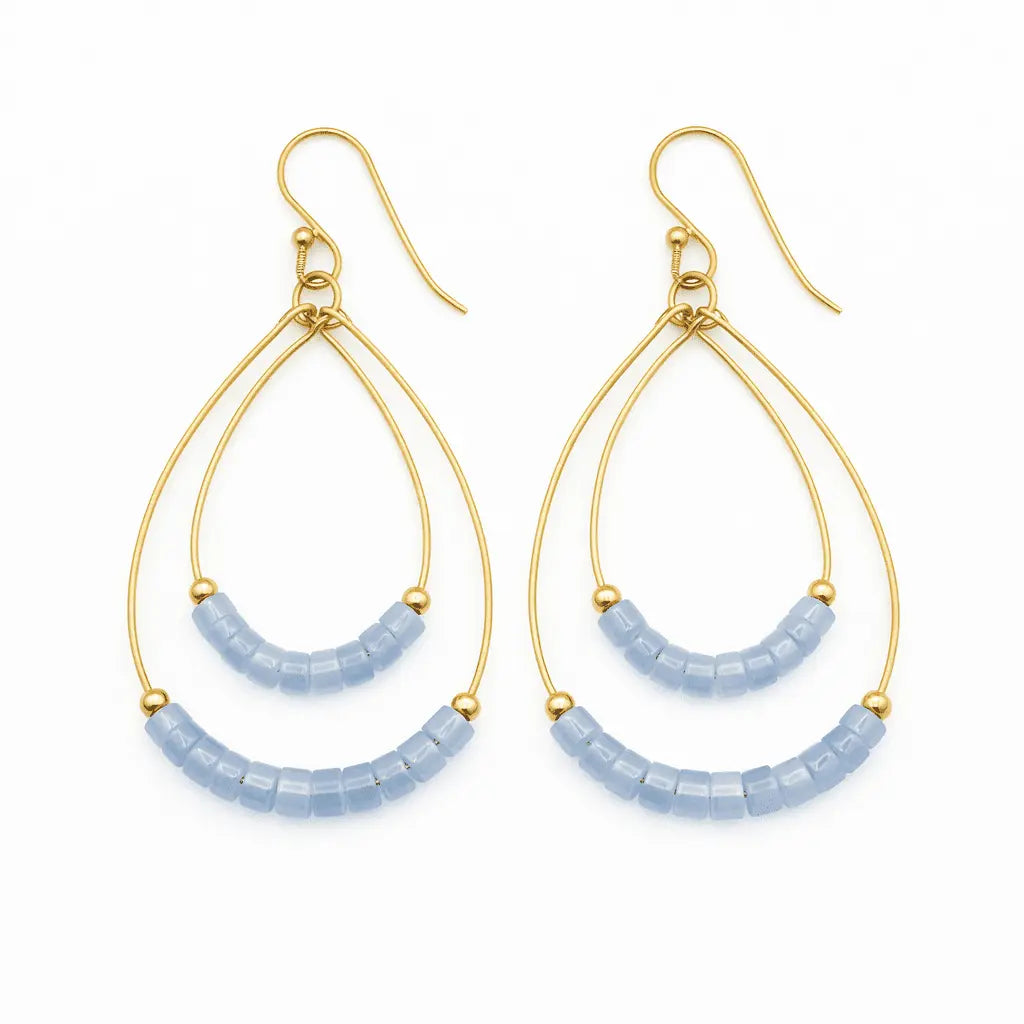 Erin Gray Heishi Ella Cate earrings in aquamarine featuring small, round jewelry beads with a vibrant blue-green color.