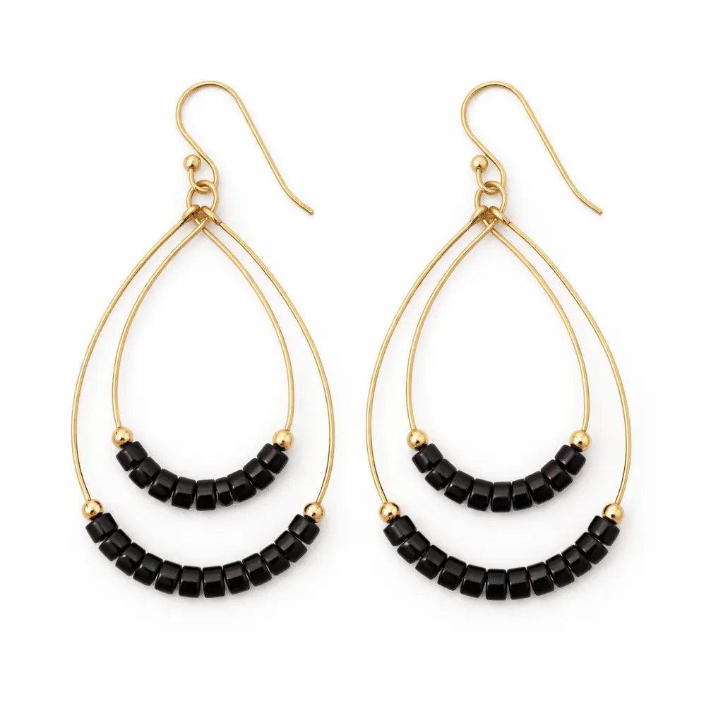 Black Heishi Ella Cate jewelry piece by erin gray featuring smooth black beads and elegant design.