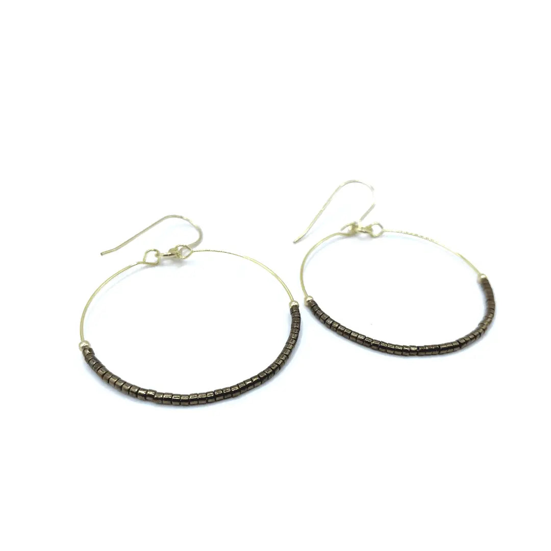 Erin Gray Hollywood Hoop earrings in Brown Cocoa leather with gold-tone accents, showcasing a stylish jewelry accessory.