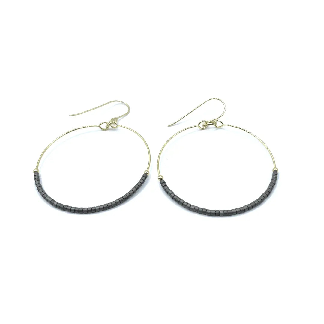 Erin Gray Hollywood Hoop earrings in graphite, stylish jewelry with a sleek hoop design, shown in a close-up image.
