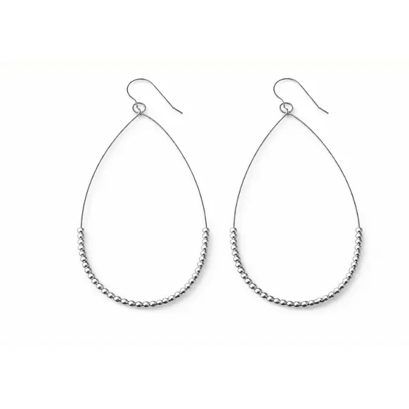 Sterling silver minimalist teardrop earring by erin gray featuring a sleek, modern design with smooth, polished surface.