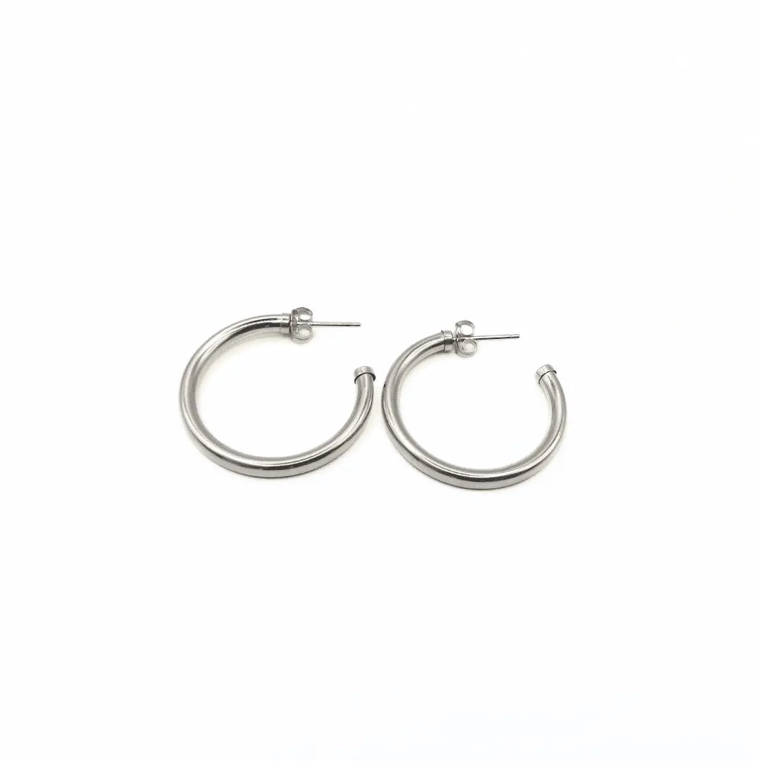 Sterling silver Paris post hoop earrings by erin gray, 34mm diameter, featuring classic circular jewelry design.