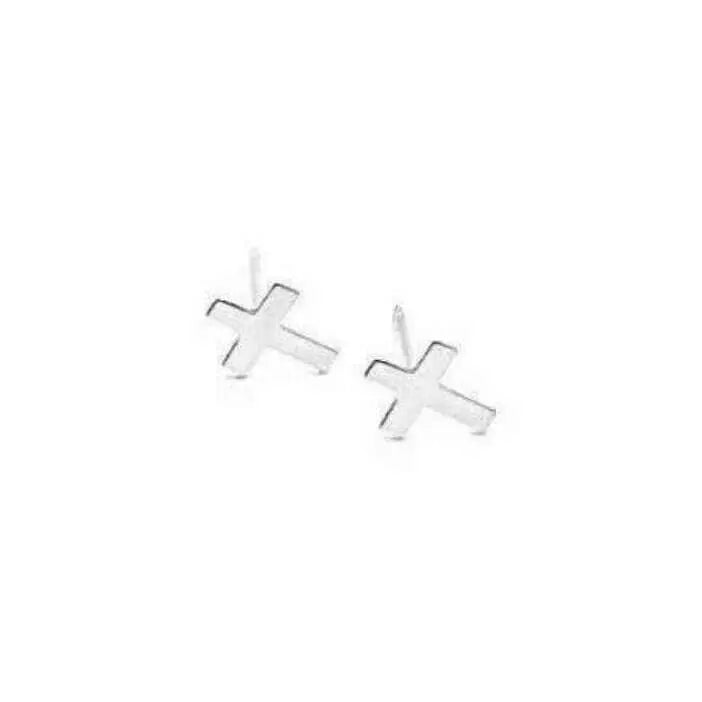 Sterling silver Itty Bitty Cross Stud earrings by erin gray, small cross-shaped jewelry with a shiny finish.