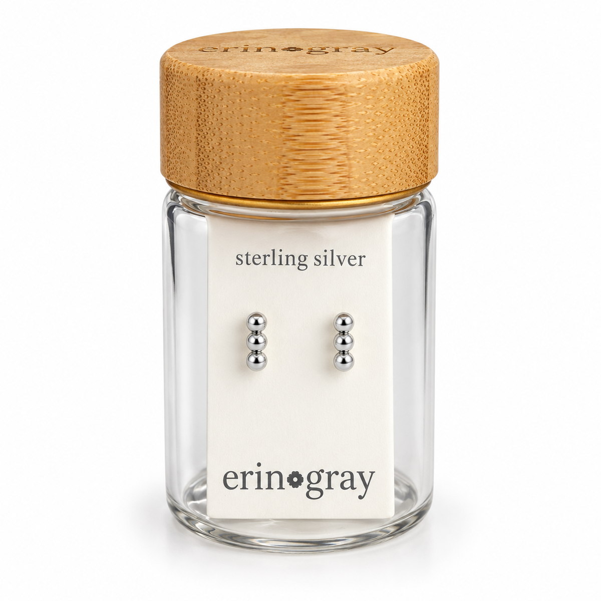 3 Dot Stud Earring in Sterling Silver in erin gray bottle