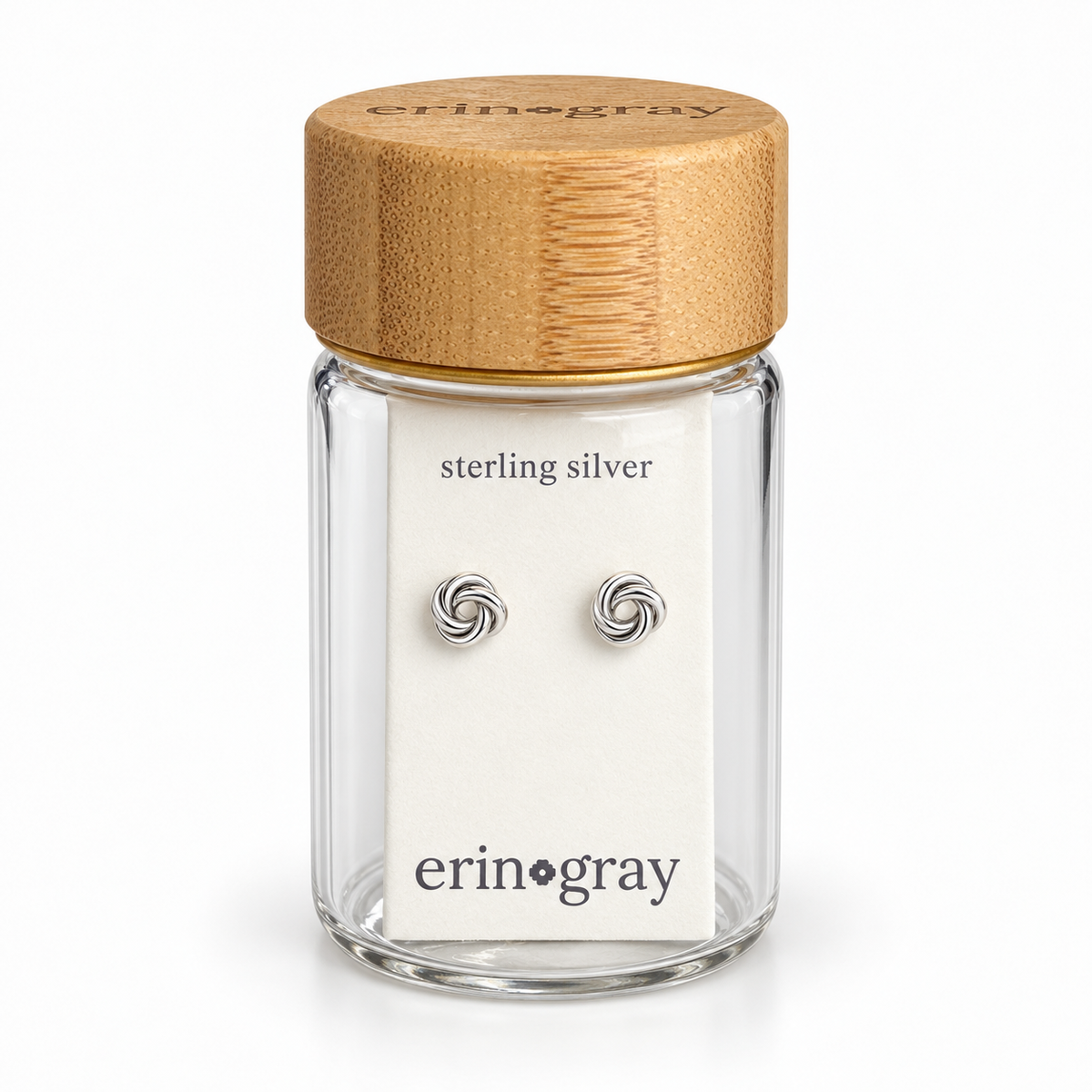 Small Knot Stud Earring in Sterling Silver in erin gray bottle