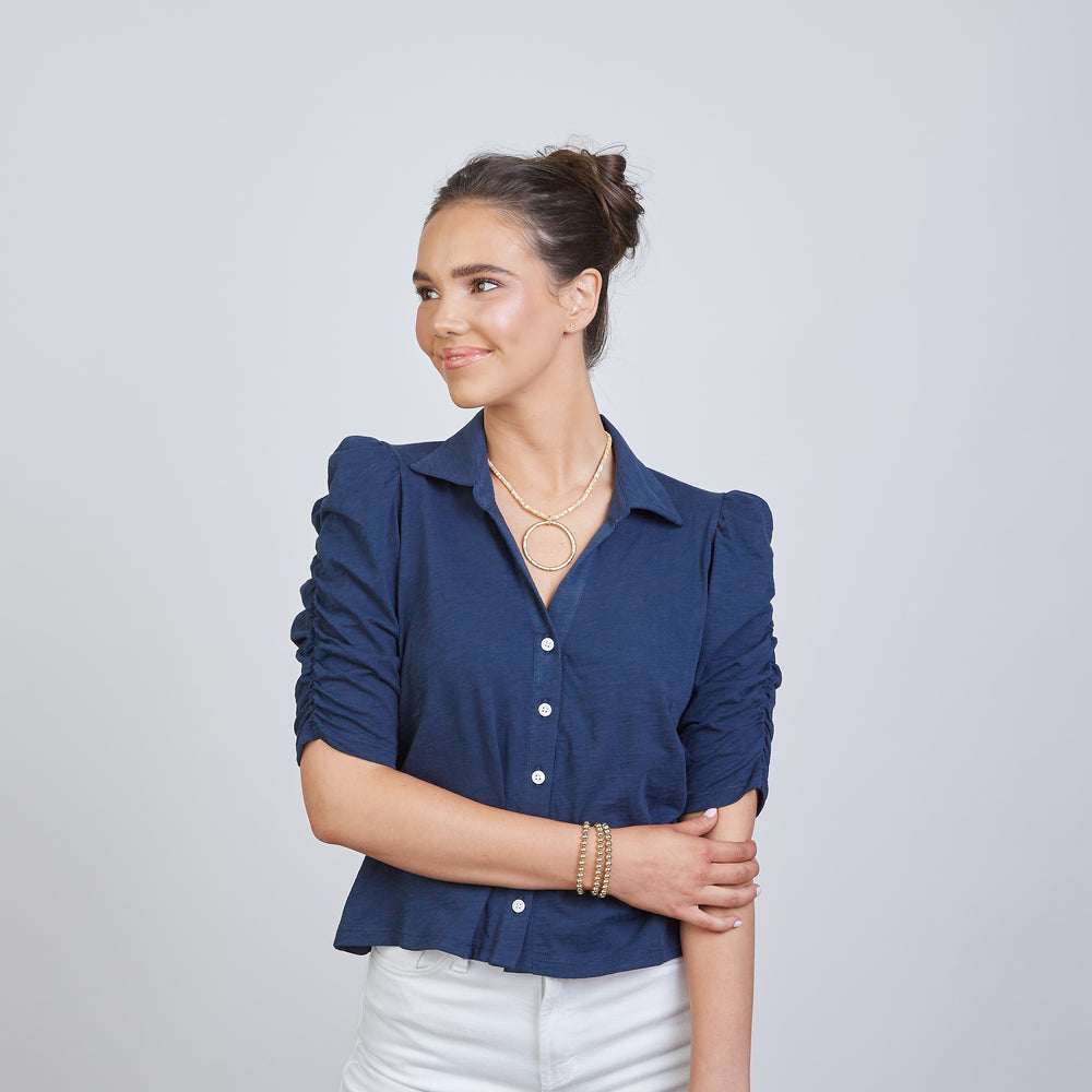 
                      
                        Grace Button-Up Elbow-Length Tee in Navy
                      
                    