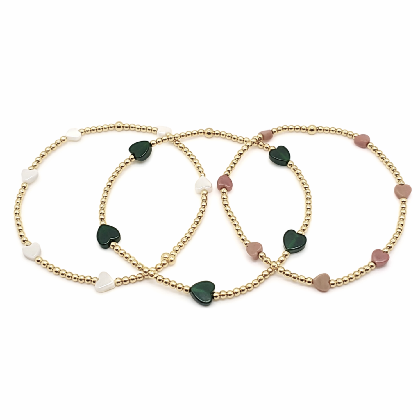 Two gold bracelets with heart-shaped beads 