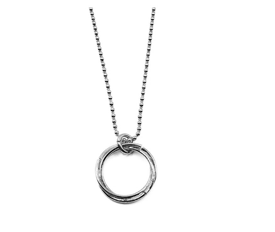 Sterling silver 16-inch Baby Bliss necklace by Erin Gray featuring a circle of friends charm, waterproof jewelry accessory.