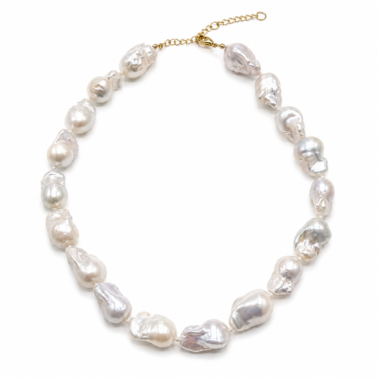 Elegant Baroque pearl statement necklace by erin gray featuring large, irregular pearls on a delicate chain.