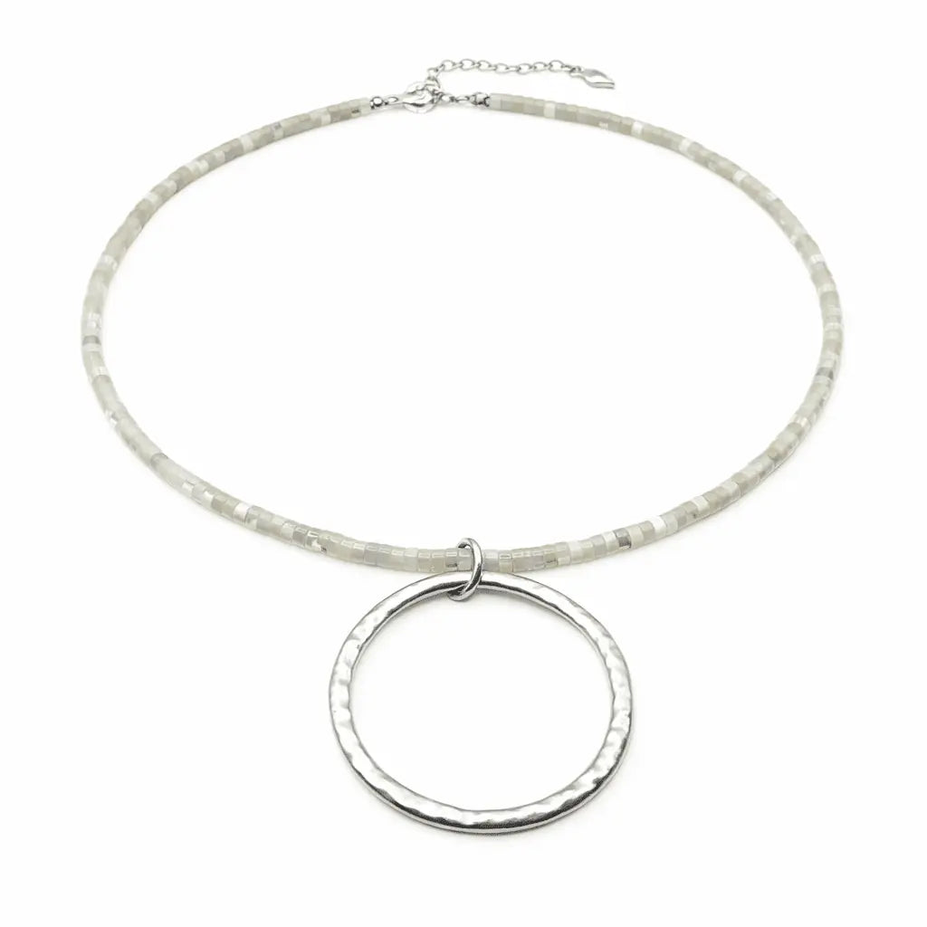 Silver Heishi necklace with large white beads, featuring a layered design in winter white, by erin gray jewelry.