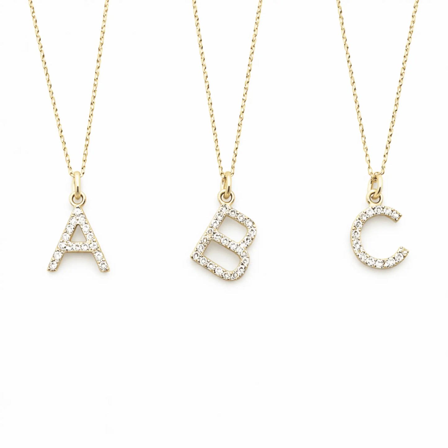 14k gold initial necklace with diamond accents, featuring a personalized pendant, jewelry by erin gray.