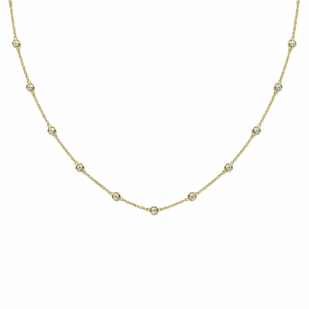 Elegant 11-diamond station necklace on 14k solid gold by Erin Gray, featuring sparkling diamonds on a delicate gold chain.