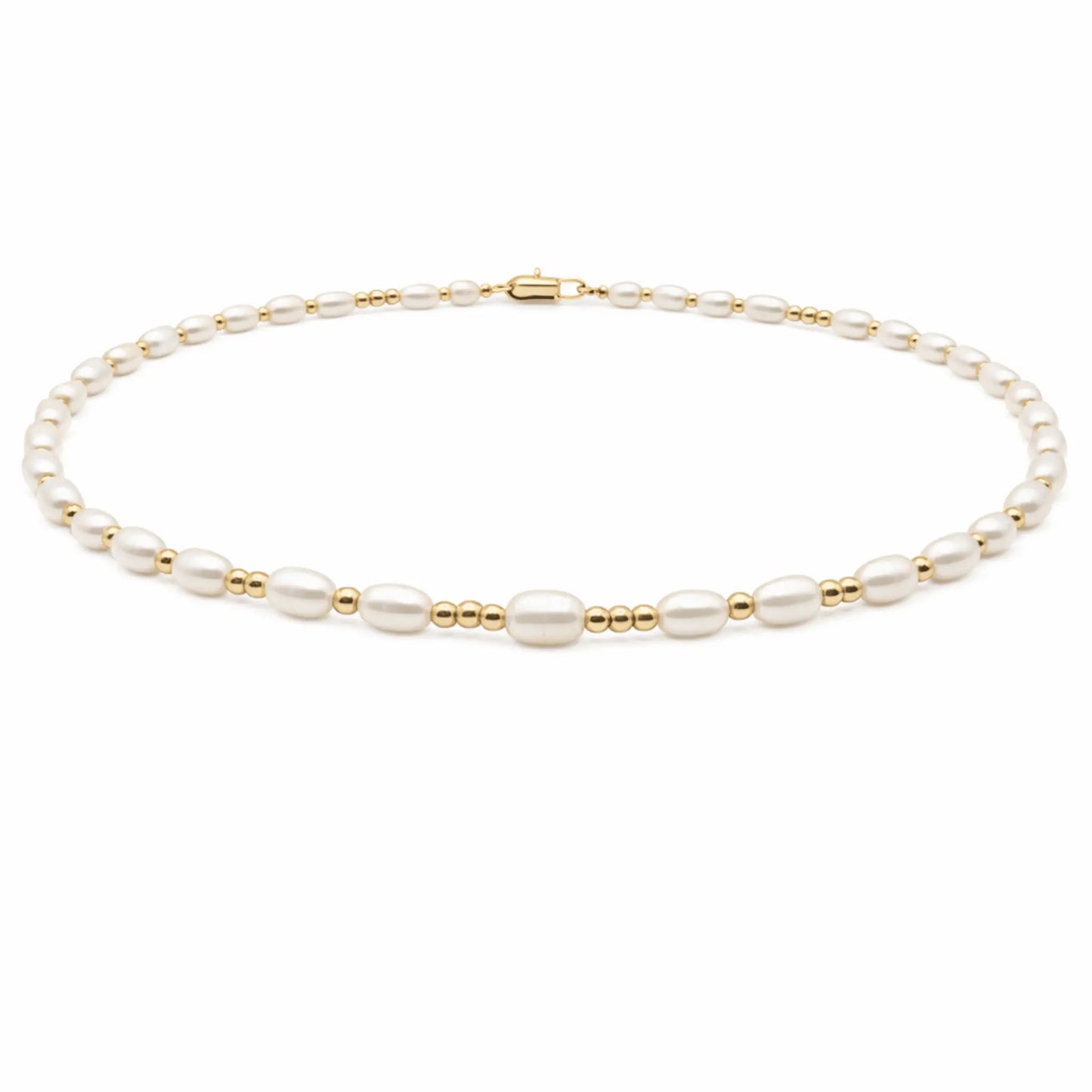 Dainty 2mm pearl necklace with 14k gold filled waterproof chain by erin gray, close-up of the jewelry on a white background.