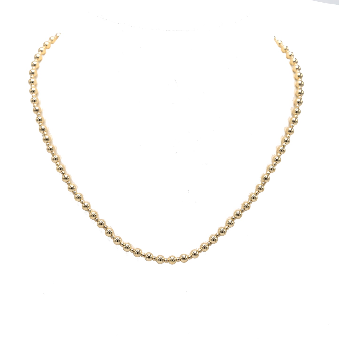 Gold-filled waterproof beaded necklace with 4mm and 2mm beads by Erin Gray, 16-inch length, showcasing layered jewelry design.