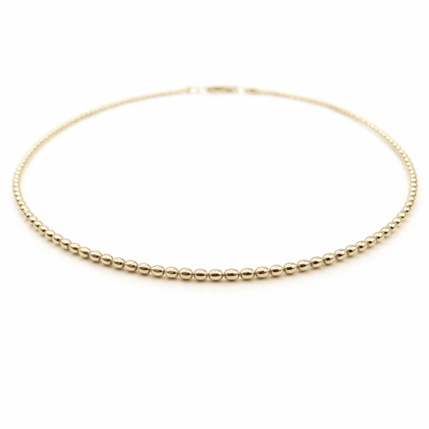 14k gold filled 15.5-inch oval pattern waterproof necklace by Erin Gray, showcasing elegant jewelry design and shiny gold finish.