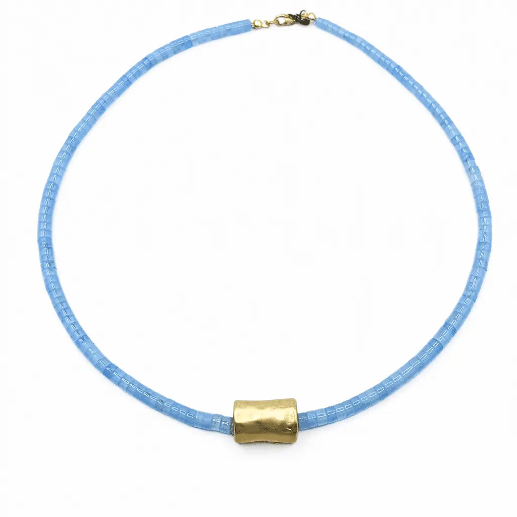 Gold barrel necklace with aquamarine heishi beads and matte finish by erin gray, featuring a central gold barrel pendant.