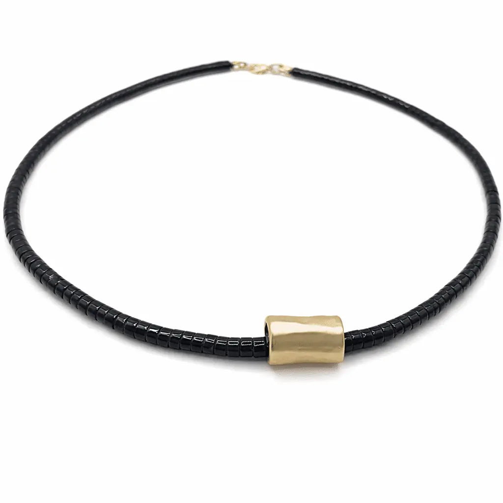 Black beaded heishi necklace with matte gold barrel pendant from Erin Gray jewelry collection.