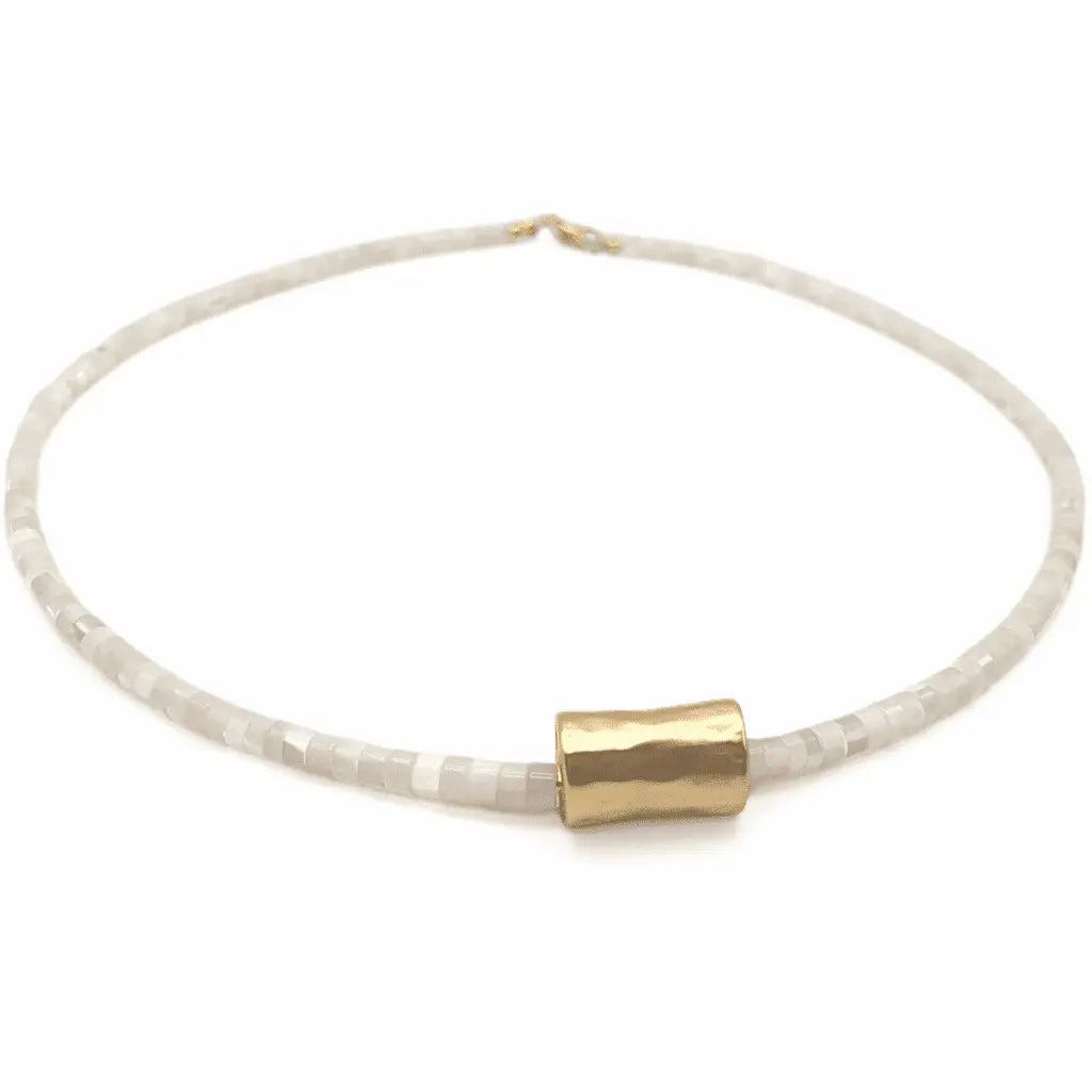 White mother-of-pearl necklace with matte gold barrel pendant from erin gray jewelry collection.