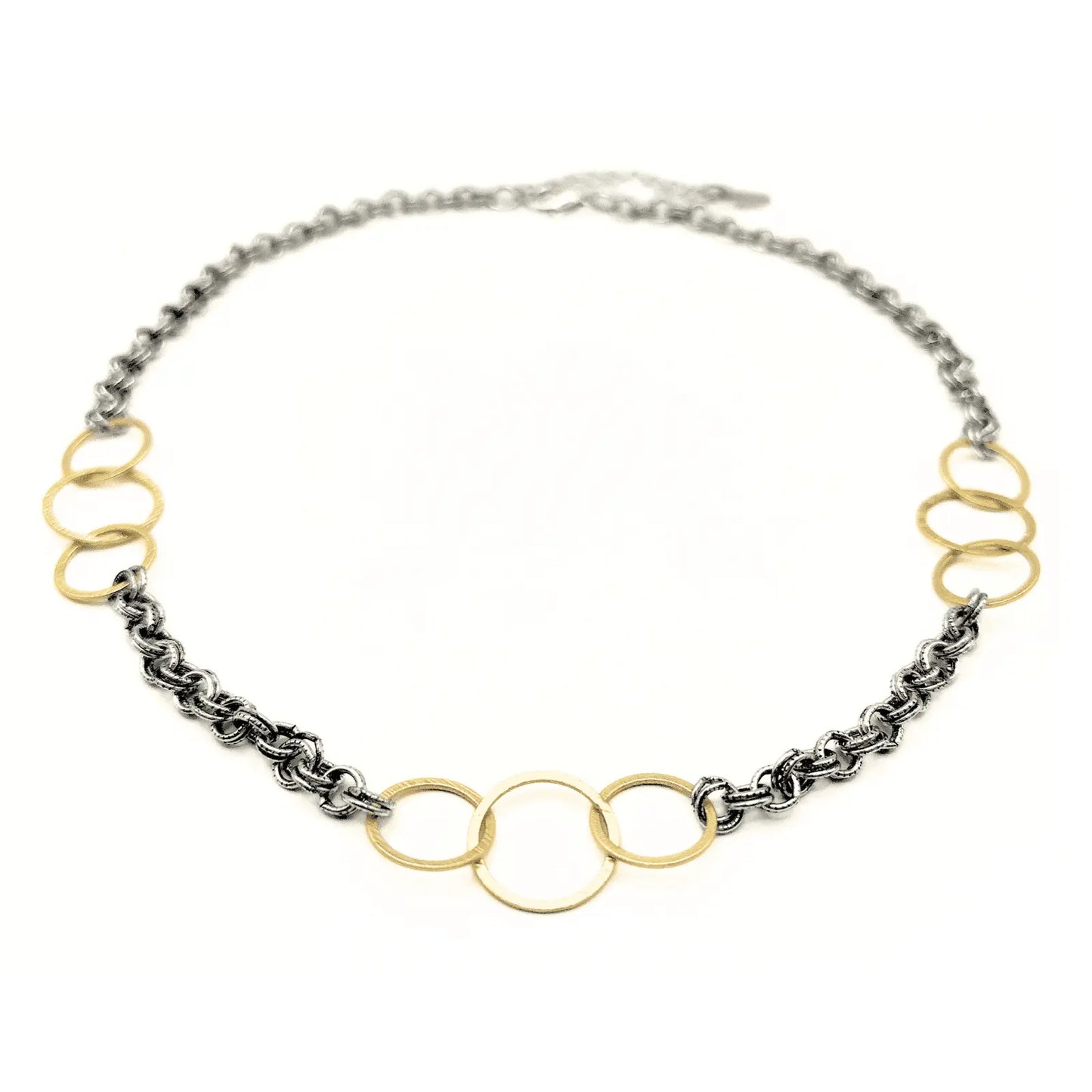 Elegant Allure Gold Trinity Statement Necklace in mixed metal from erin gray, featuring layered chain design and intricate details.