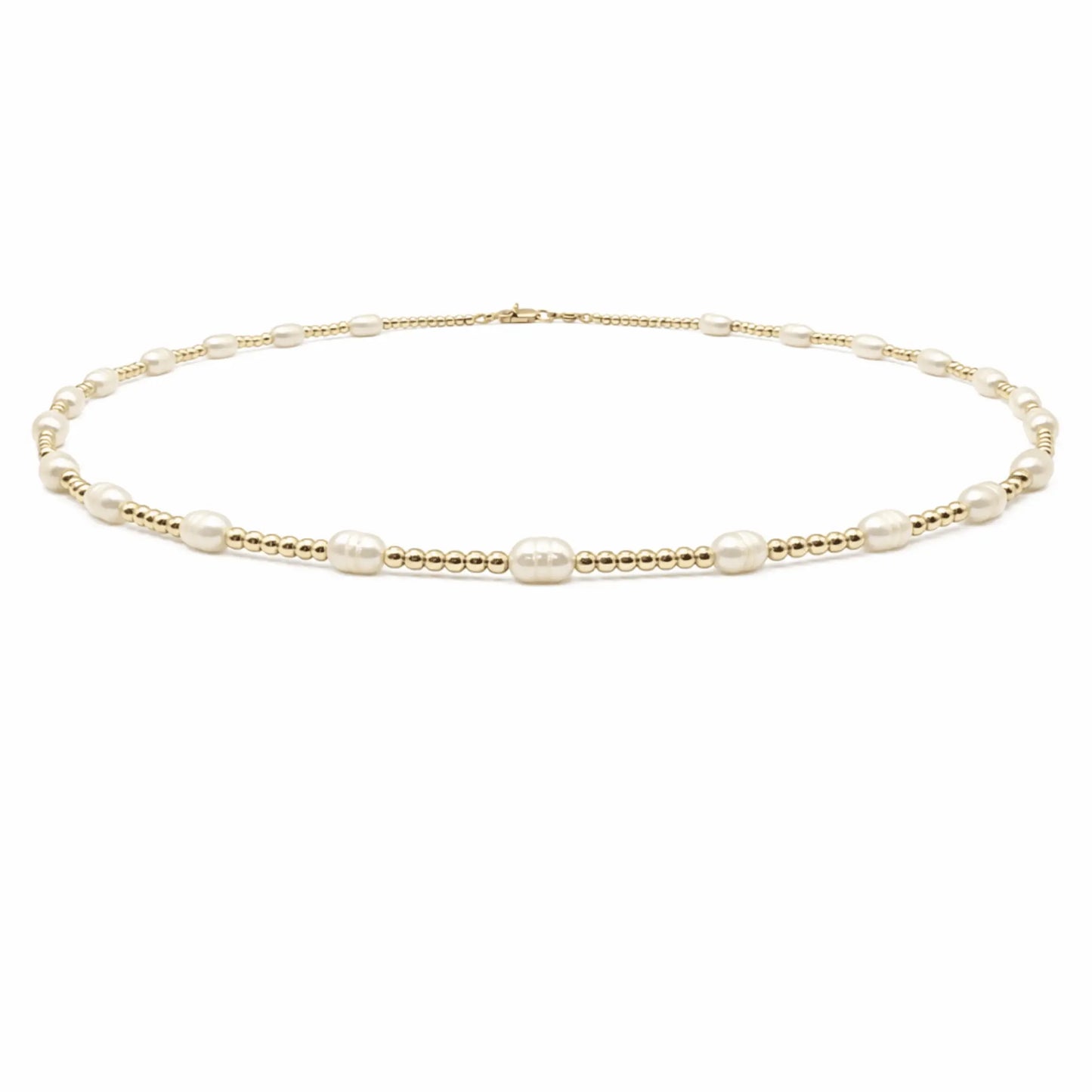 Erin Gray rice pearl 2mm necklace in 14K gold filled, waterproof jewelry with small, smooth pearl beads on a delicate chain.