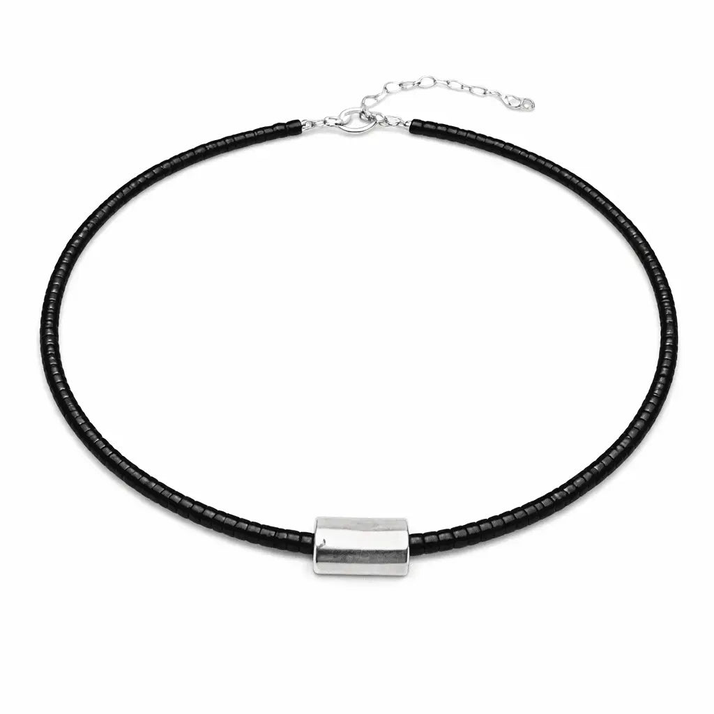 Heishi matte silver barrel necklace in black with small round beads, featuring a sleek, modern jewelry design by erin gray.