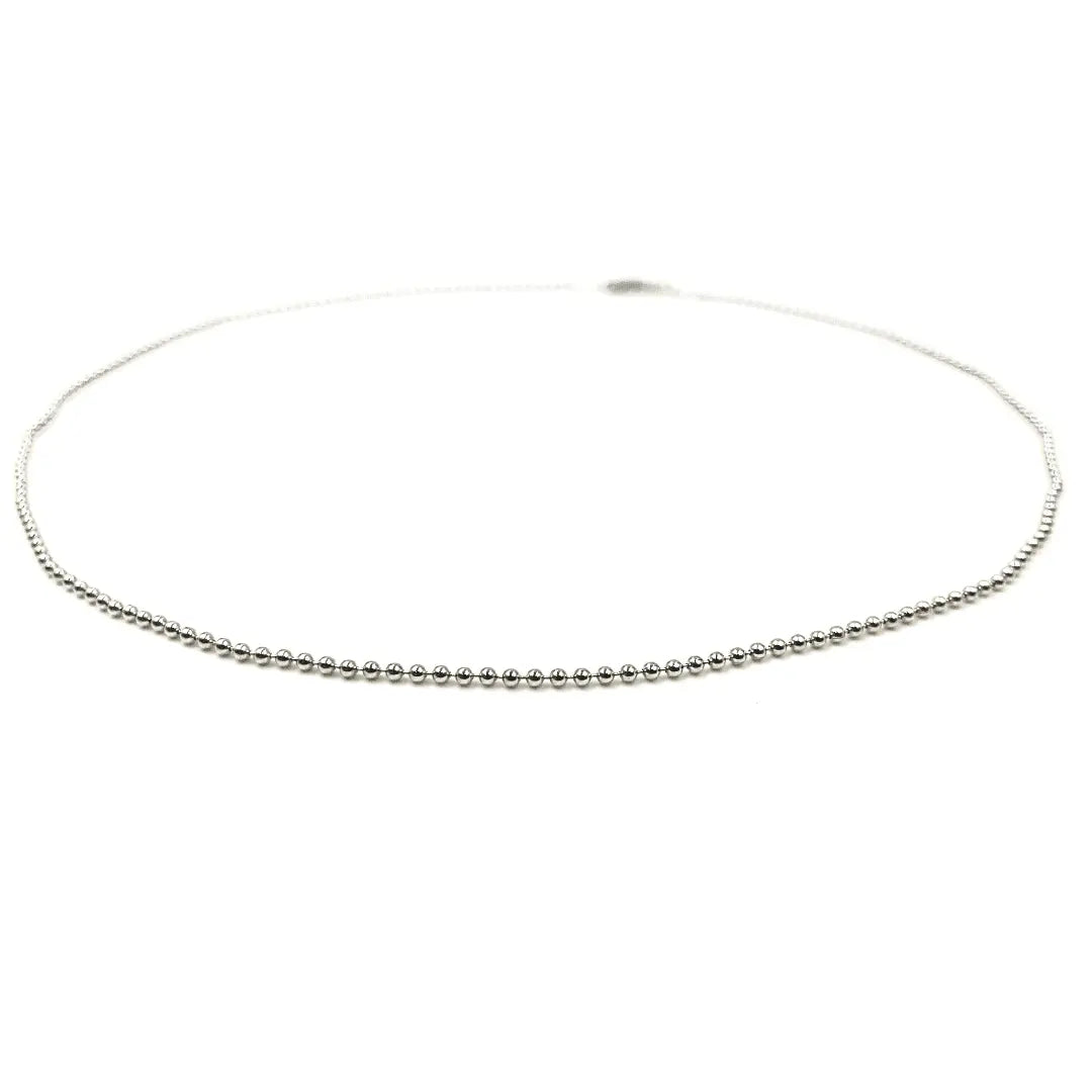Sterling silver 18-inch Baby Bliss necklace by erin gray, featuring a waterproof jewelry design with delicate chain and charm.